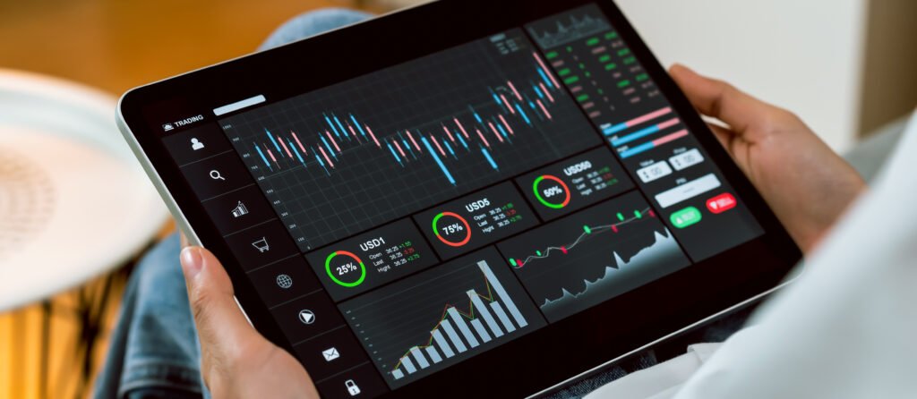 Trader reviewing pre-market stock charts on a tablet