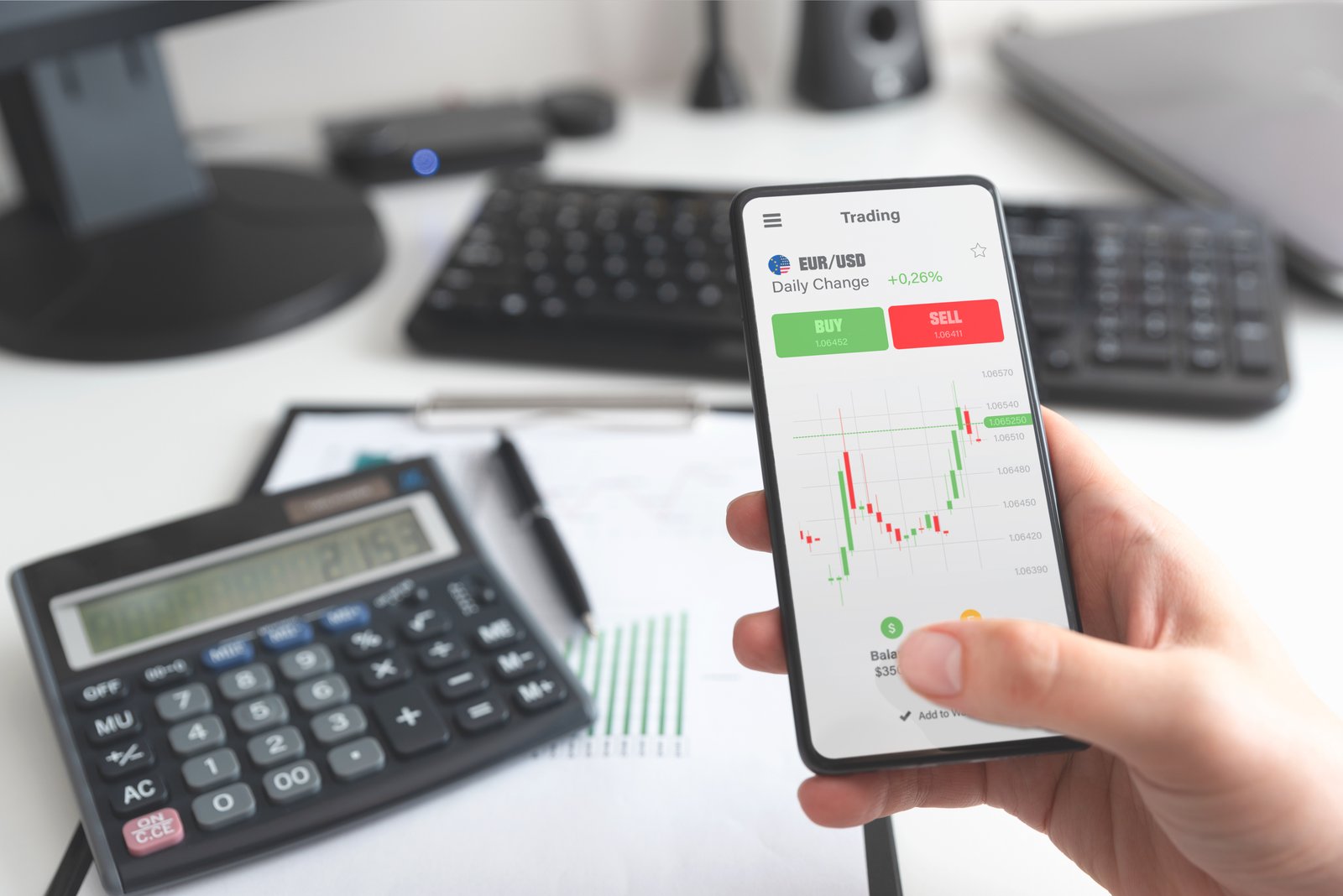 Investor placing a stop-loss or limit order using a stock trading mobile app